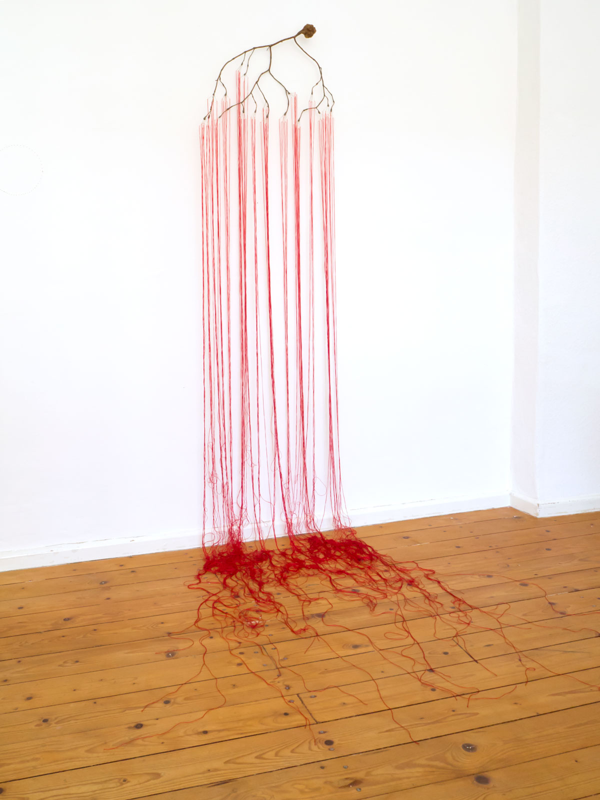 Anja Asche – selbstlos / selfless – sculpture / object art, branch, yarn, needles, wax, about 55 x 180  x 60 cm, 2019